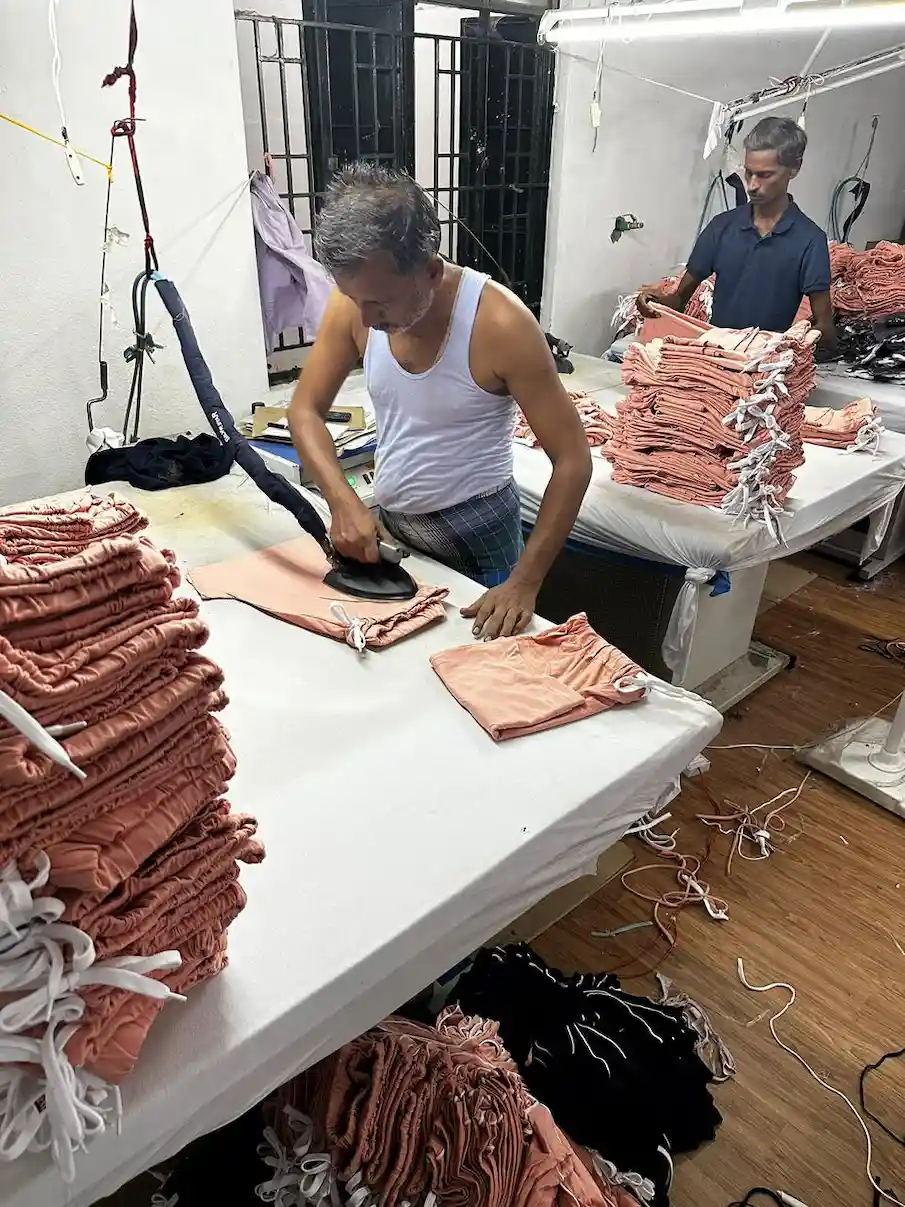 Industrial steam pressing and finishing process for corporate promotional garments